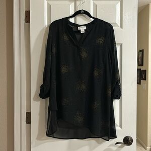Women’s black tunic  top.  Very dressy.   Never worn.  Sheer fabric with Cami.
